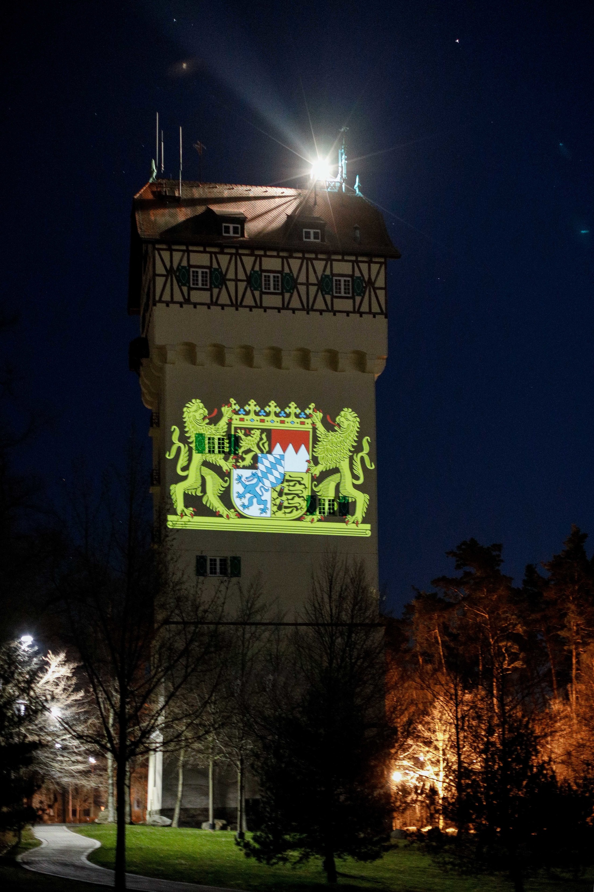 The illuminated water tower at Tower Barracks in Grafenwoehr, Germany (2020).