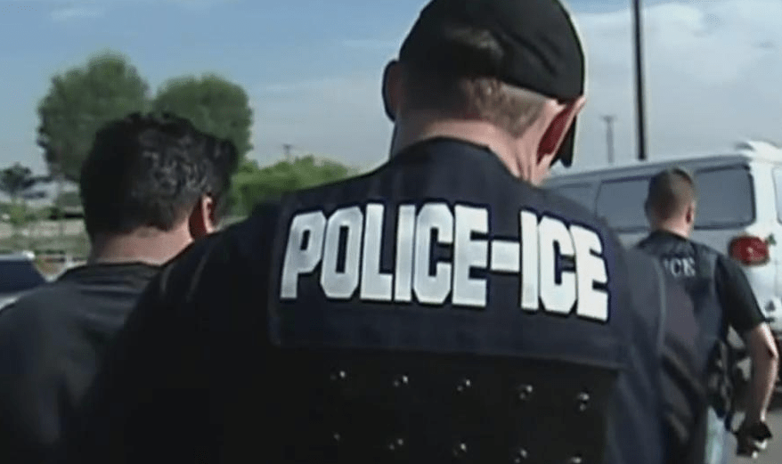 ice police arresting someone