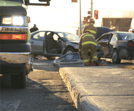 car crash with ambulance at the scene of a manslaughter