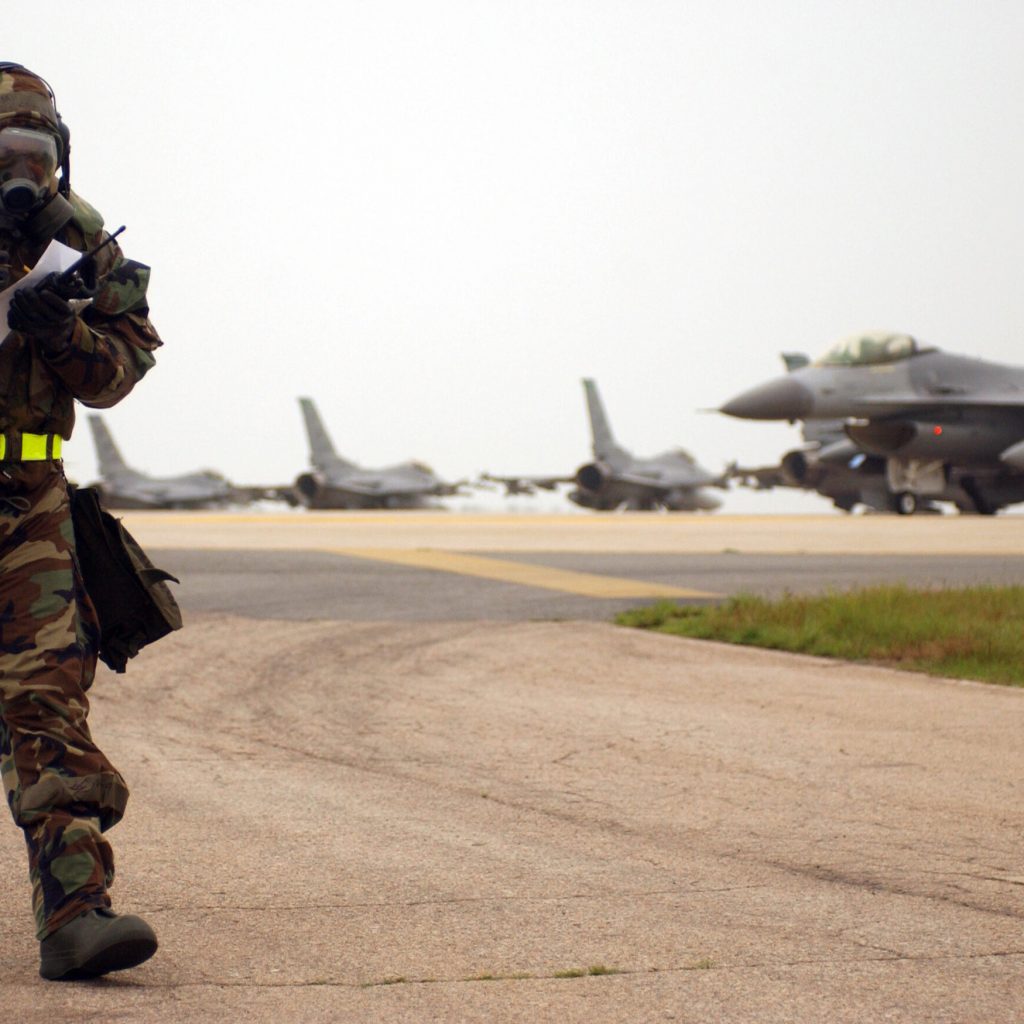 070726-F-QA315-019 U.S. Air Force Staff Sgt. Corey Jones, assigned to the 8th Maintenance Squadron, Kunsan Air Base, Republic of Korea, reviews over his checklist while in chemical warfare gear during an Operational Readiness Exercise July 26, 2007. The 8th Fighter Wing is currently conducting the quarterly exercise to test its ability to maintain a credible deterrence on the Korean peninsula. (U.S. Air Force photo by Senior Airman Steven R. Doty/Released)