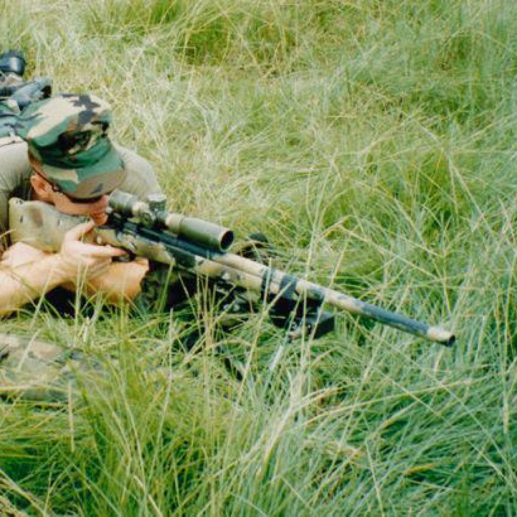 cobra Army men on practice with gun