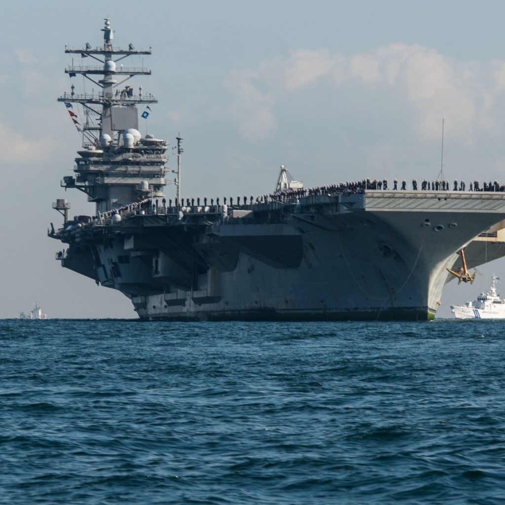 USS Ronald Reagan (CVN 76) 171204-N-CL027-112 TOKYO BAY (Dec. 4, 2017) Sailors man the rails as the Navy’s forward-deployed aircraft carrier, USS Ronald Reagan (CVN 76), arrives at Commander, Fleet Activities Yokosuka after a scheduled patrol. The Ronald Reagan Carrier Strike Group conducted 87 days of strike group operations in the Western Pacific, including the waters south of Japan, the Philippine Sea and the South China Sea. Ronald Reagan provides a combat-ready force, which protects and defends the collective maritime interests of the U.S. and its allies and partners in the Indo-Asia-Pacific region. (U.S. Navy photo by Mass Communication Specialist 2nd Class Janweb B. Lagazo/Released)